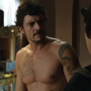 Orlando Bloom cut chest and tattoo