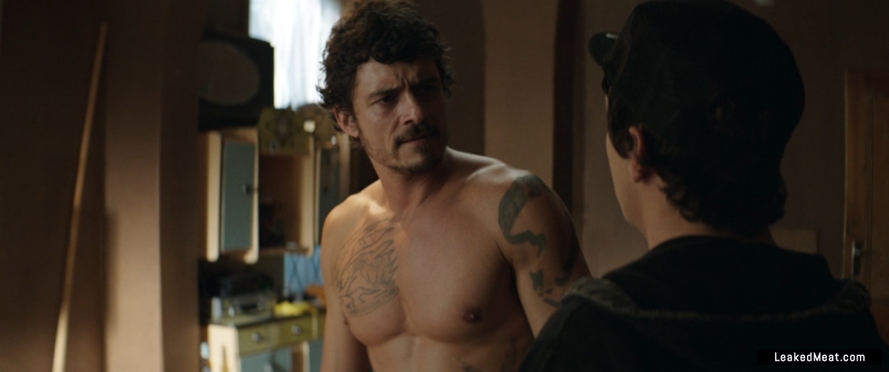 Orlando Bloom cut chest and tattoo