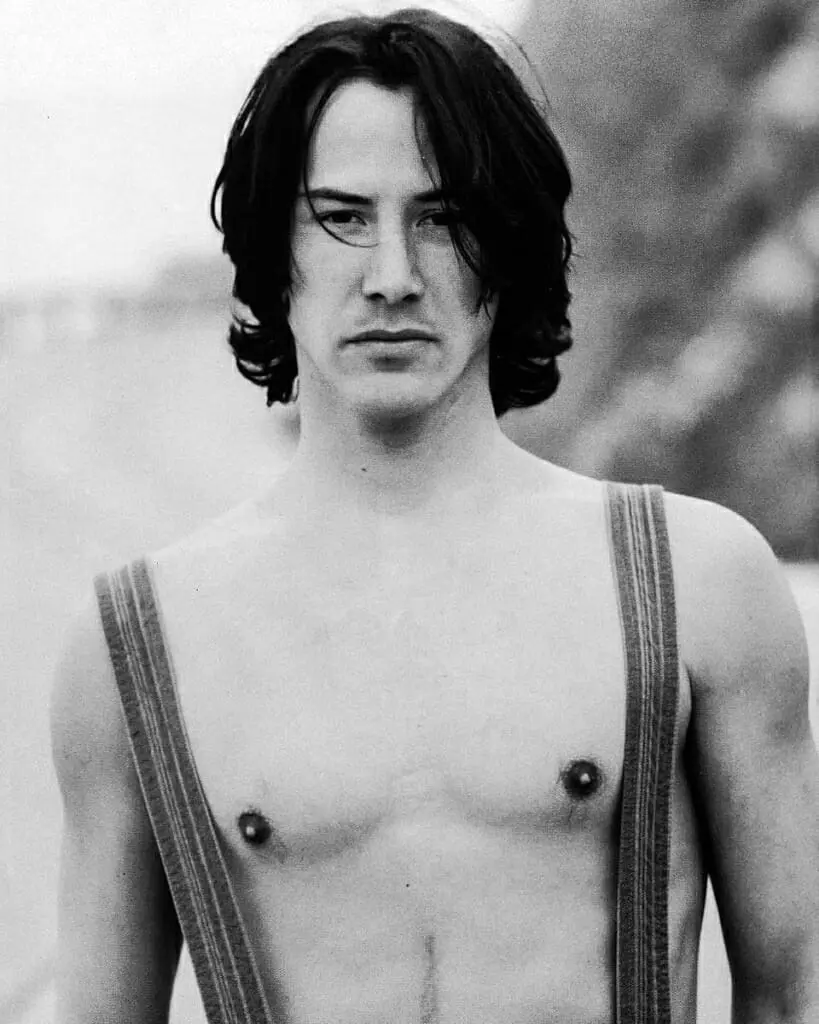 Keanu Reeves suspenders shirtless