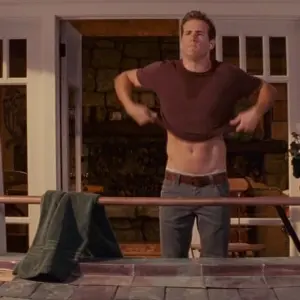 Ryan Reynolds taking off his shirt
