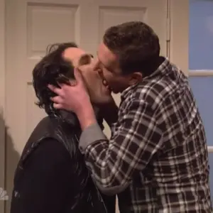Paul Rudd french kissing a man