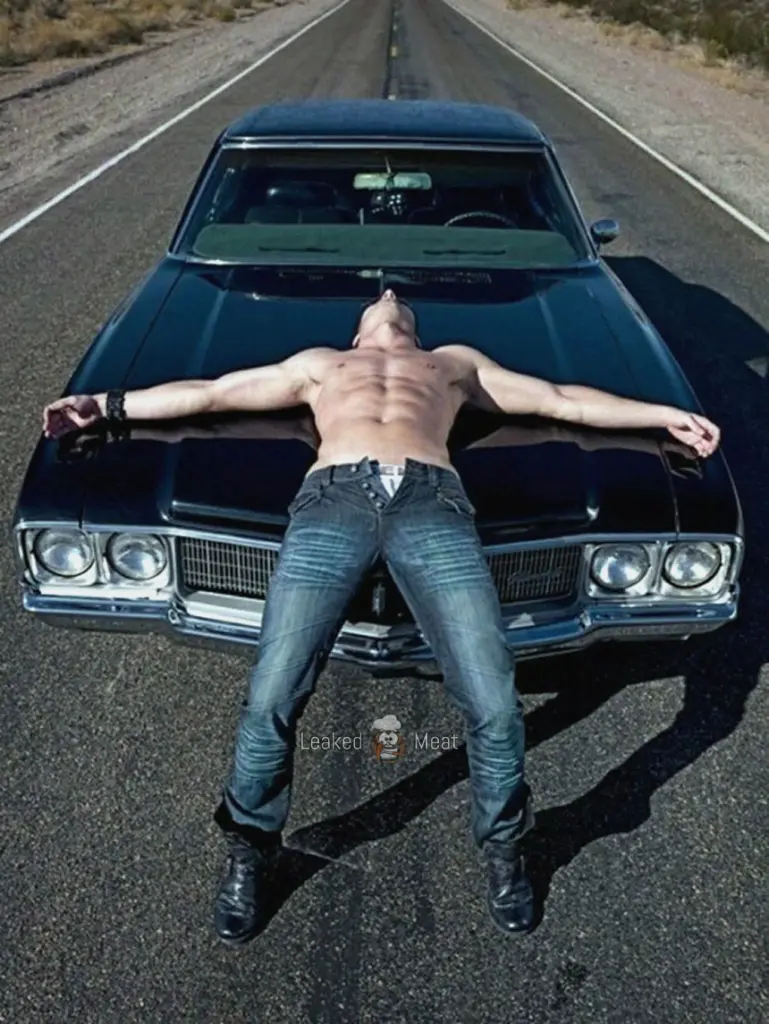 Dean Winchester (Jensen Ackles) shirtless on his Impala